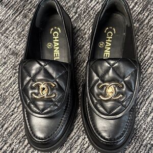 CHANEL Black Quilted Leather Loafers with Gold Logo